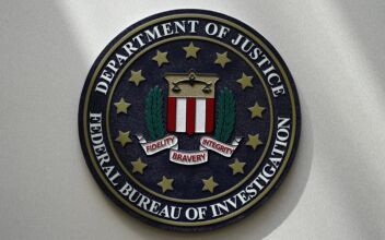 FBI Says Man Had Guns, Ammo, Fake Marshal ID in Baggage