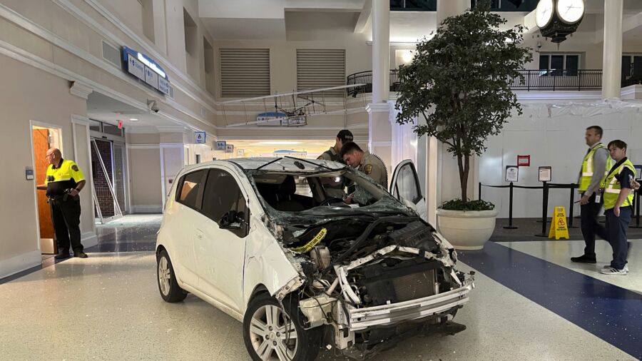 Sheriff: Vehicle Crashes in Airport Terminal, Driver Charged