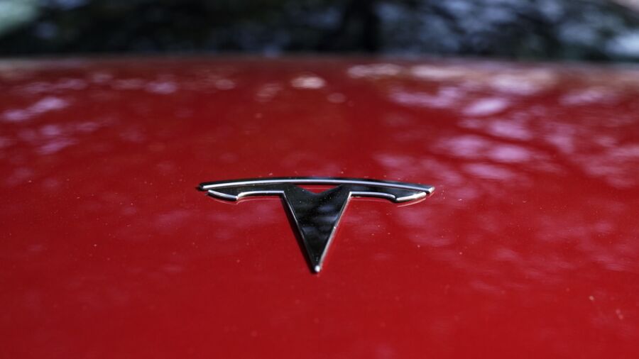 Tesla Says It Will Cut Costs of Next Generation Cars in Half
