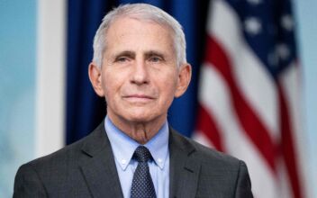 Fauci Confronted by Man While Promoting Vaccine