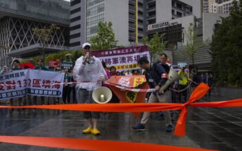 Hongkongers Hold First Protest in Years Under Strict Rules