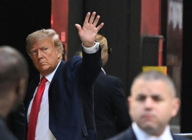 Trump waves