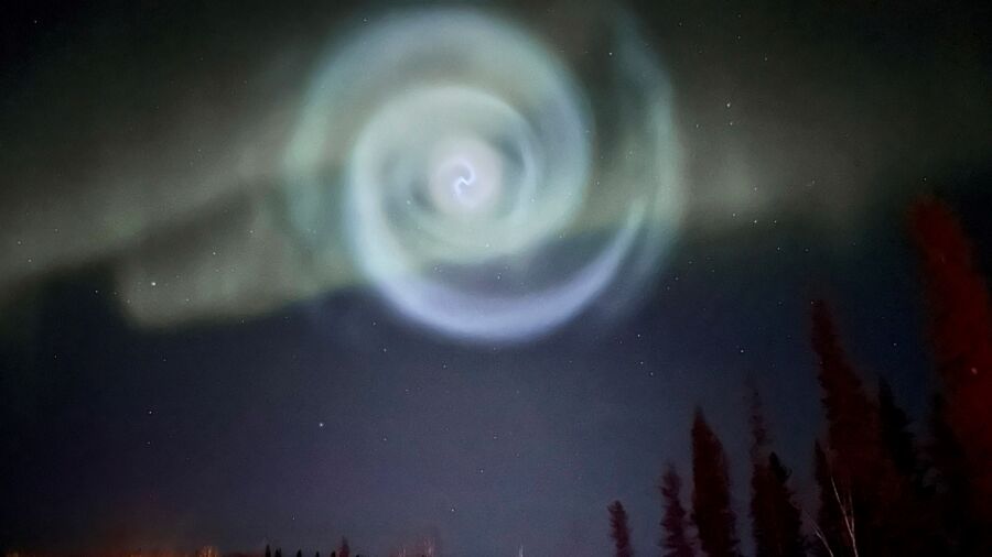 Odd Spiral Appears Amid Northern Lights in Alaska Night Sky
