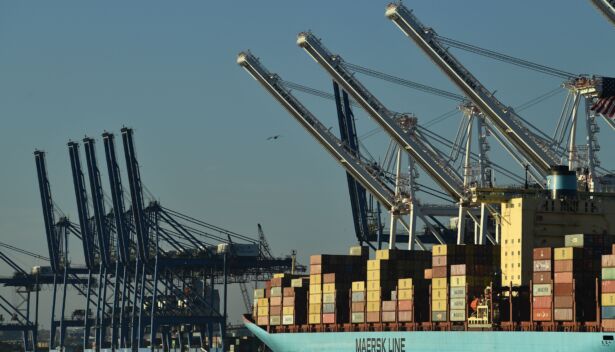 Cranes stack cargo containers