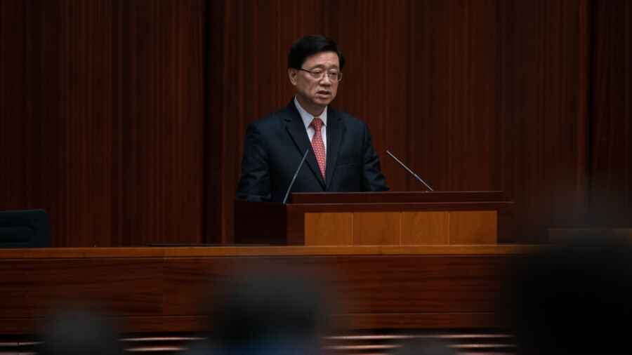 Hong Kong Leader Responds to China's Jailing of US Man