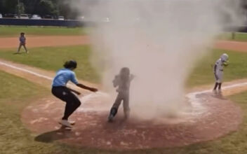 ‘Dust Devil’ Engulfs Child at Baseball Game