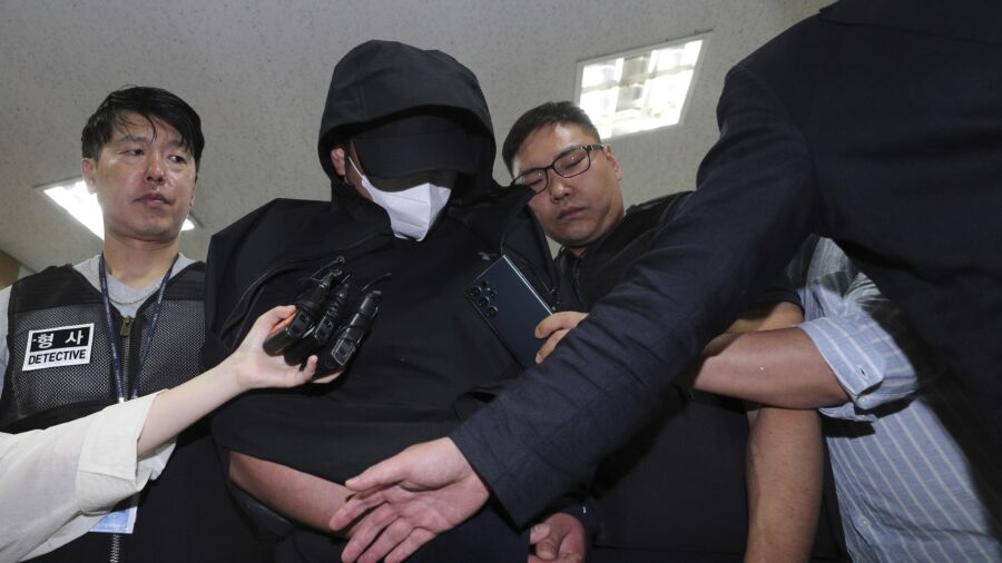 South Korean Arrested for Opening Plane Exit Door Mid-Air, Faces up to 10 Years in Prison