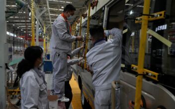 China Factory Activity Slows, Adding to Economic Strains