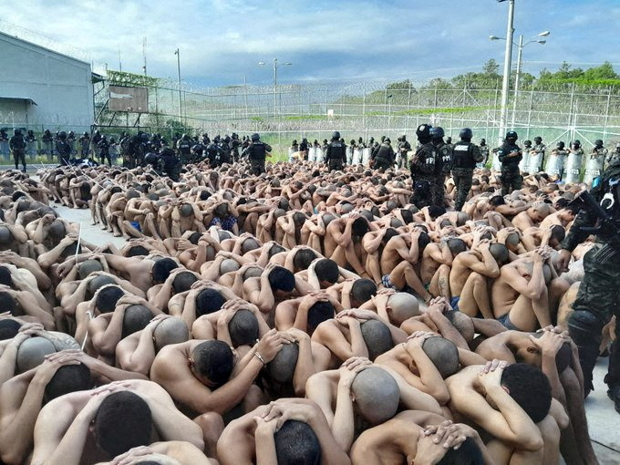 Members of the Military Police of Public Order guard gang members after the Honduras Armed Forces took over the control of the prisons nationwide as part of the "Fe y Esperanza" operation, in a handout picture released on June 26, 2023. (Honduras Armed Forces/Handout via Reuters)