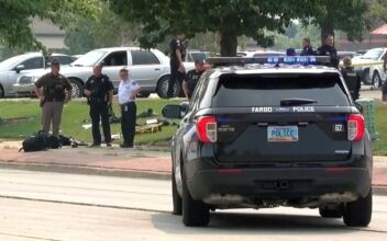 Officer Killed and 2 Police Injured in Shooting That Also Left Suspect Dead on a North Dakota Street