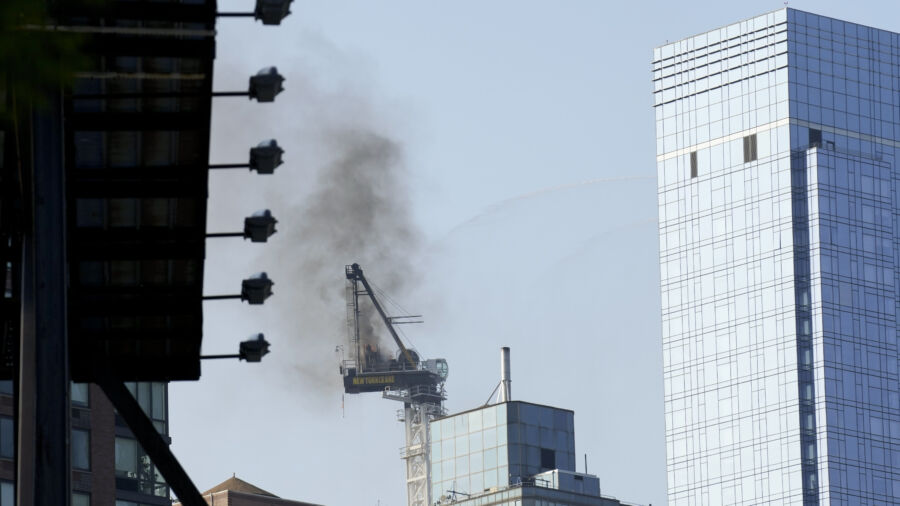 Pedestrians Scatter as Fire Causes New York Construction Crane's Arm to Collapse and Crash to Street