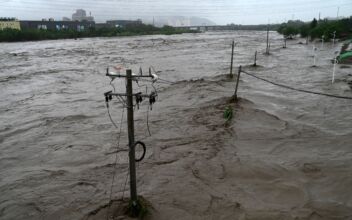 Weaker Doksuri Drenches North China, Beijing Evacuates Thousands