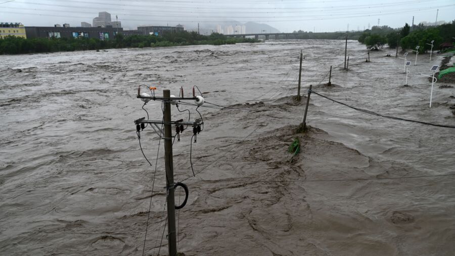 Weaker Doksuri Drenches North China, Beijing Evacuates Thousands
