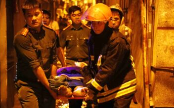 Fire at Vietnam Apartment Block Kills 56