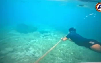 ‘Special Operation’: Philippines Removes Chinese Barrier at Disputed Shoal in South China Sea