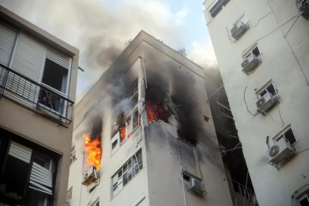 A Tel Aviv Building Ablaze Following Rocket Attacks From The Gaza Strip