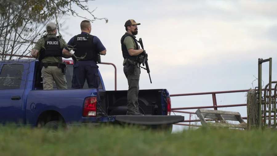 Police Surround Home in Search for Suspect in Fatal Shooting of 18 in Maine