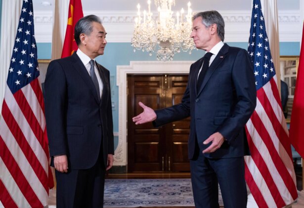 U.S. Secretary of State Antony Blinken speaks with Chinese Foreign Minister Wang Yi prior to meetings at the State Department in Washington on Oct. 26, 2023. (Saul Loeb/AFP via Getty Images)