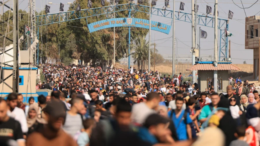 More Gazans Flee South After Explosion Rocks Hospital