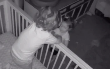 Loving Brother Helps Cute Little Sister to Get Out of Her Crib