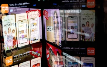 This photo illustration shows the Temu app in the App Store reflected in videos of Shein consumers, in Washington, DC, on February 23, 2023. (Stefani Reynolds / AFP via Getty Images)