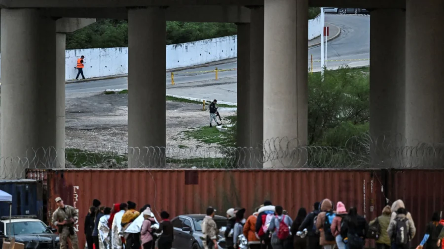 Biden Administration Threatens to Sue Texas Over New Border Security Law