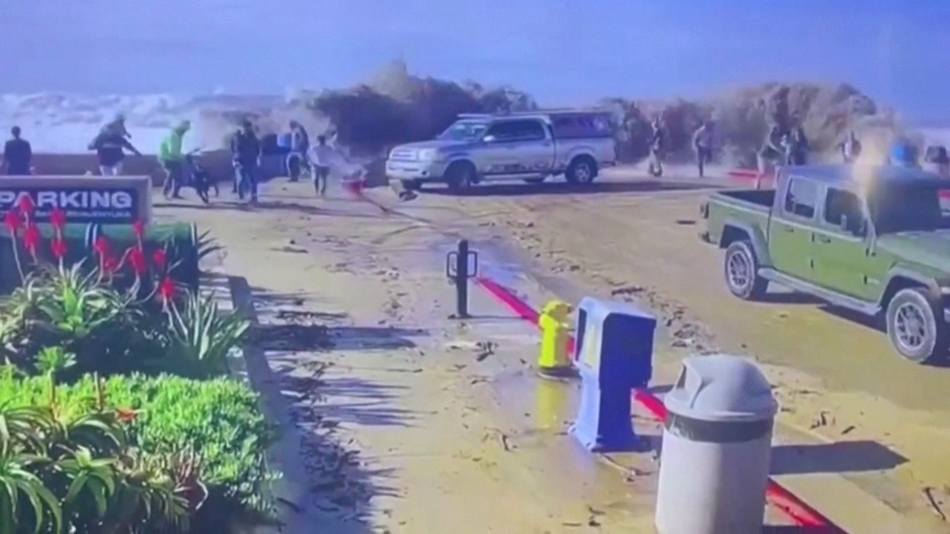 Dramatic Video Captures Monster Waves Sweeping Away Onlookers on