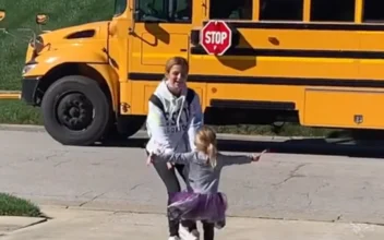 Little Girl Waits for Sisters to Get Off School Bus Every Day