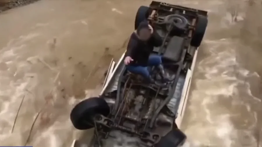 Woman Rescued After 15 Hours on Top of Car