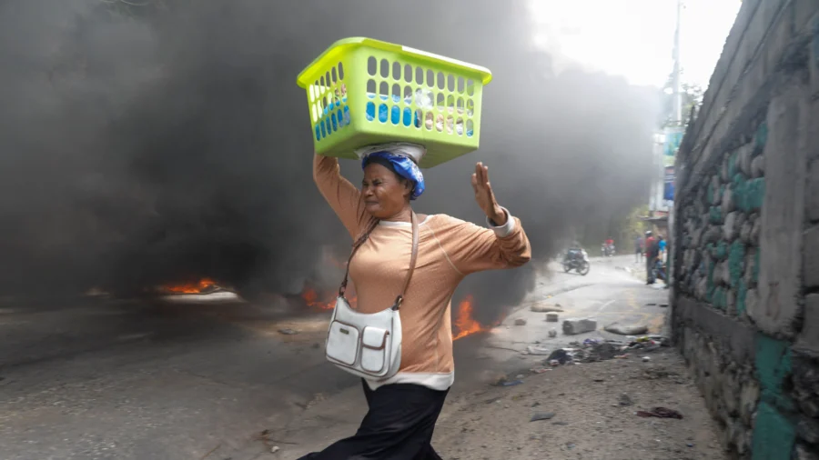 Protests Erupt Across Haiti as Demonstrators Demand That Prime Minister Resign