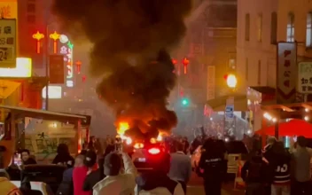 Crowd Sets Waymo Self-Driving Vehicle Ablaze in San Francisco