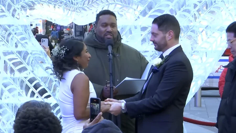 Times Square Hosts Weddings, Surprise Proposals on Valentine's Day