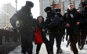 More Than 400 Detained in Russia at Events in Memory of Navalny, Rights Group Says