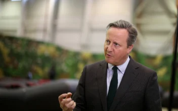 Cameron Urges Hong Kong to Reconsider New Law