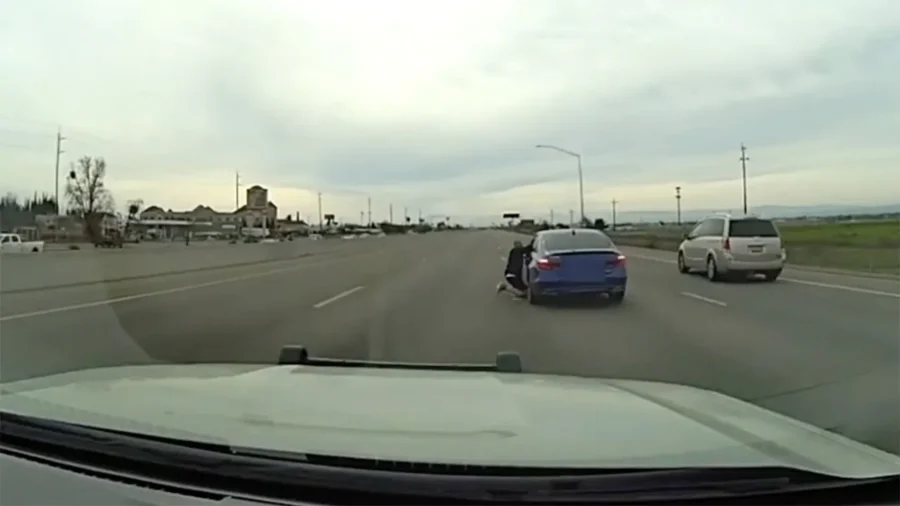 Video Shows Suspect Clinging to Side of Moving Car During Police Chase ...