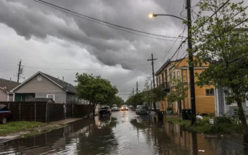 Storm clouds roll across New Orleans on April 10, 2024, as water rises in the Treme neighborhood. (Chris Granger/The Times-Picayune/The New Orleans Advocate via AP)