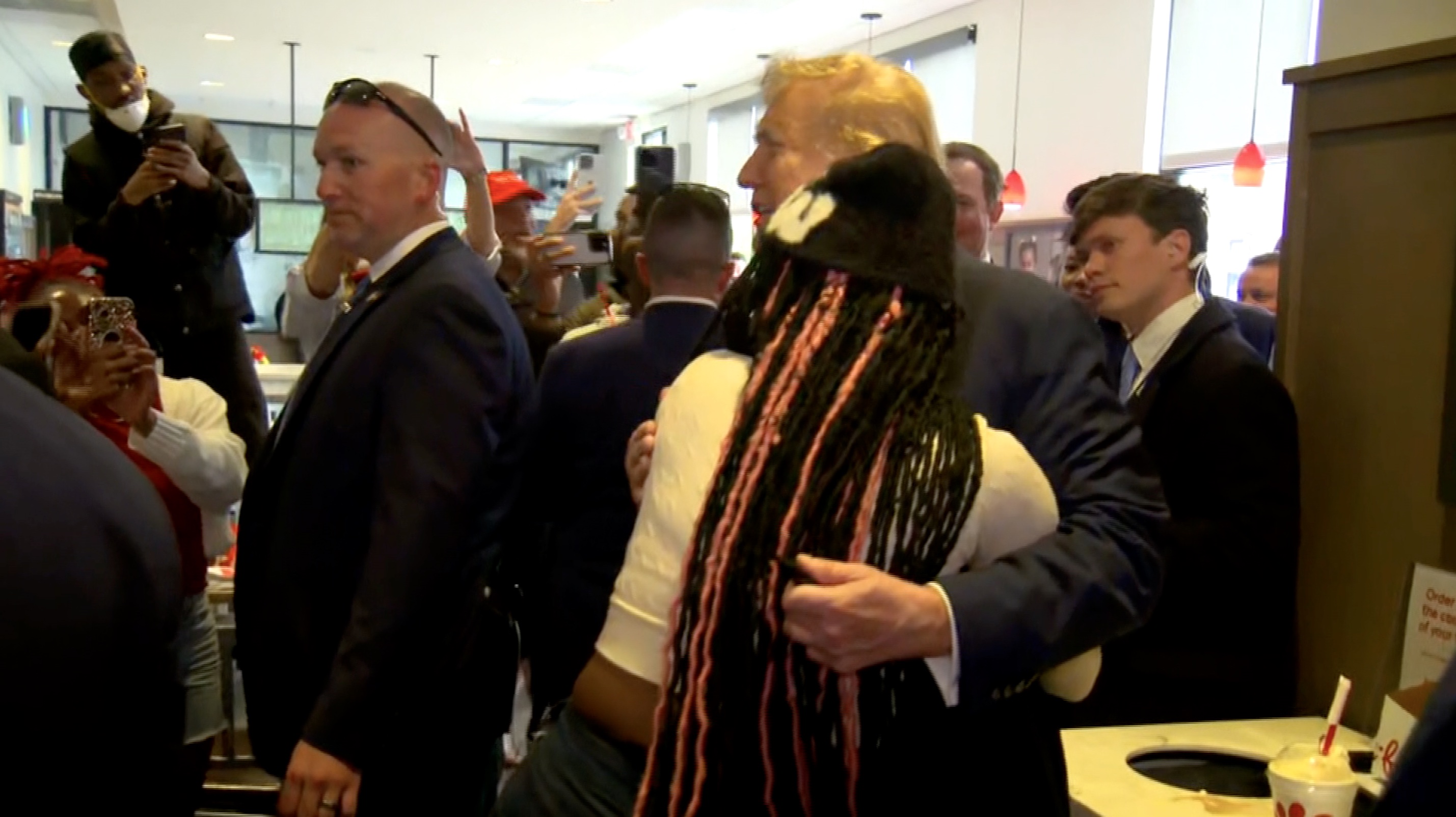 Video: Trump Stops at Chick-fil-A, Hugs Supporter | NTD