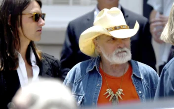 Dickey Betts, a founding member of the Allman Brothers Band, exits the funeral of Gregg Allman at Snow's Memorial Chapel in Macon, Ga., on June 3, 2017. (Jason Vorhees/The Macon Telegraph via AP)