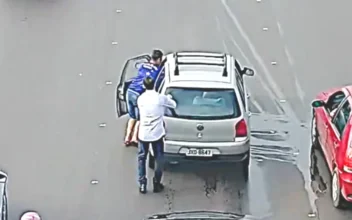 Guy Jumps Through the Window of Moving Car and Saves It From Crashing