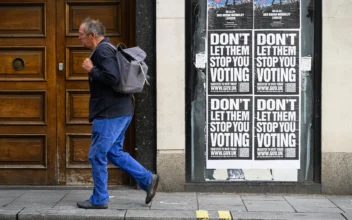 Billboard posters reminding people to register to vote ahead of the May elections are seen on April 16, 2024 in London, England. (Leon Neal/Getty Images)