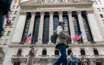 People walk past the New York Stock Exchange (NYSE) in New York City on April 10, 2024. (Spencer Platt/Getty Images)
