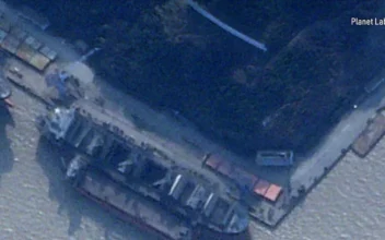 A ship accused of transporting North Korean munitions to Russia was photographed docking at a Chinese port.  (Screenshot via NTD)
