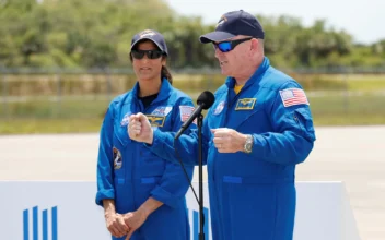 NASA astronauts Butch Wilmore, right, and Suni Williams speak to the media after they arrived at the Kennedy Space Center in Cape Canaveral, Fla., on Thursday, April 25, 2024. (AP Photo/Terry Renna)