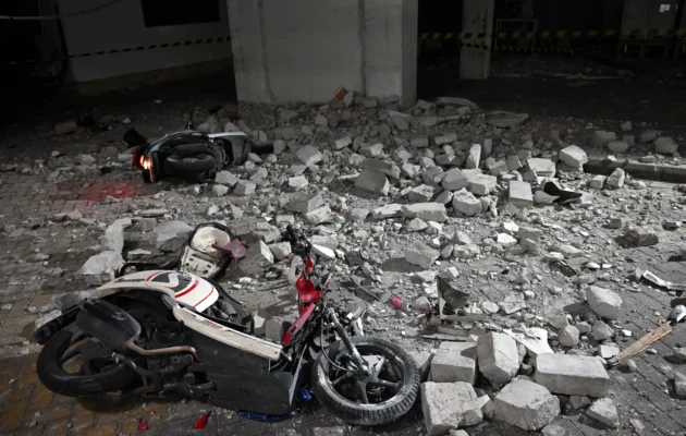 Damaged scooters hit by debris lay at a parking after a magnitude-6.4 offshore earthquake hit near Indonesia's Java island, at Airlangga university hospital in Surabaya on March 22, 2024. (Juni Kriswanto/AFP via Getty Images)