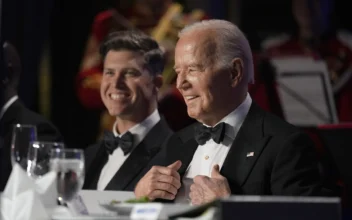 President Joe Biden (R) and host Colin Jost attend the White House Correspondents' Association Dinner at the Washington Hilton in Washington on April 27, 2024. (Manuel Balce Ceneta/AP Photo)