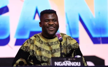 Francis Ngannou speaks during the Anthony Joshua v Francis Ngannou Press Conference at Outernet London in London on Jan. 15, 2024. (Alex Pantling/Getty Images)