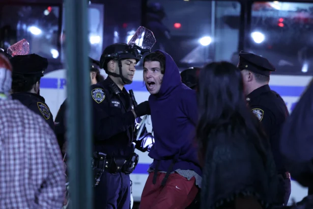 NYPD officers arrest students as they evict a building