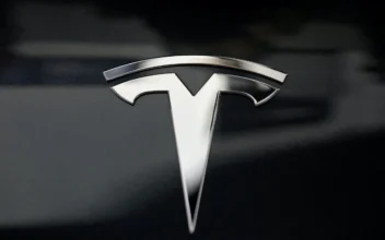 Tesla Lays Off Two Senior Executives, Hundreds of Employees