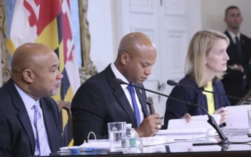 Maryland Gov. Wes Moore (C); Treasurer Dereck Davis (L); and Comptroller Brooke Lierman (R) who comprise the Board of Public Works, are seen in Annapolis, Md., on Nov. 8, 2023. (Brian Witte/AP Photo)