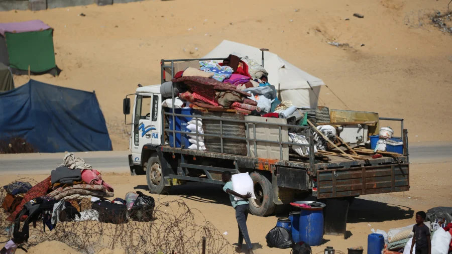 Displaced Families in Rafah Flee for Safety
